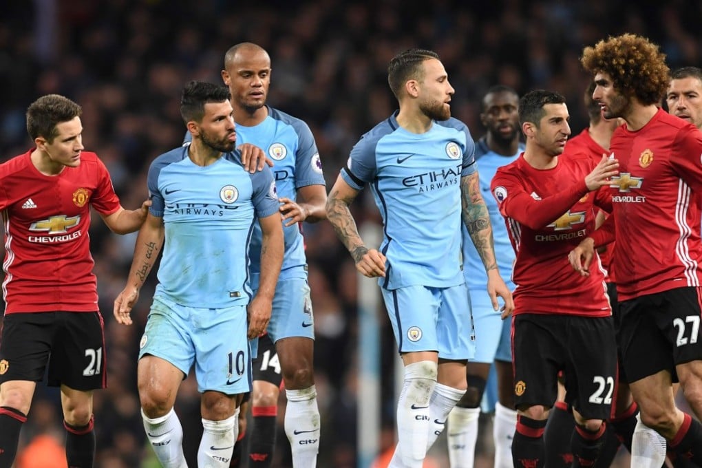 Tempers fray between Manchester United’s Marouane Fellaini and City’s Sergio Aguero when the teams last met in the Premier League in April. Photo: AFP