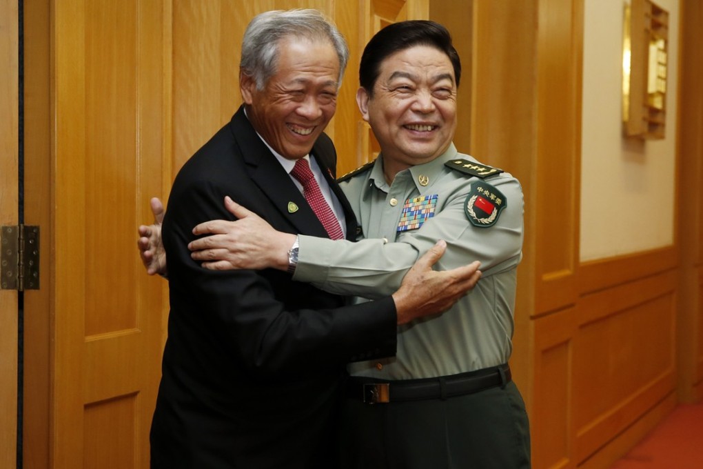 Ng Eng Hen (left), Singapore’s defence minister, greets Minister of Defence Chang Wanquan in Beijing in September. Photo: CNS