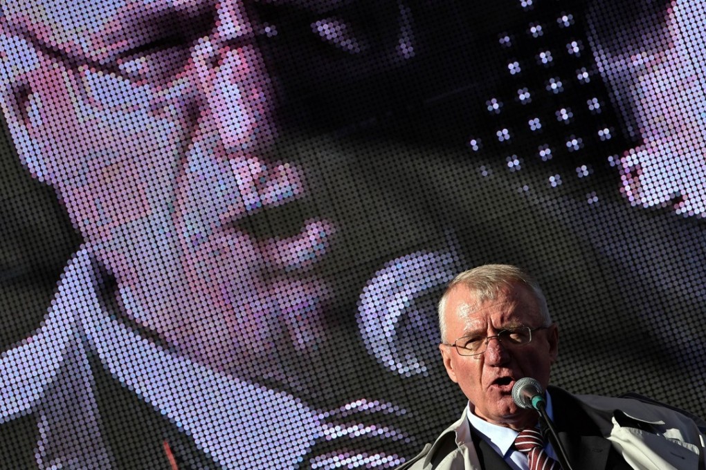 Serbian nationalist politician Vojislav Seselj addresses supporters during an anti-government rally in Belgrade in November, 2014. Photo: AFP