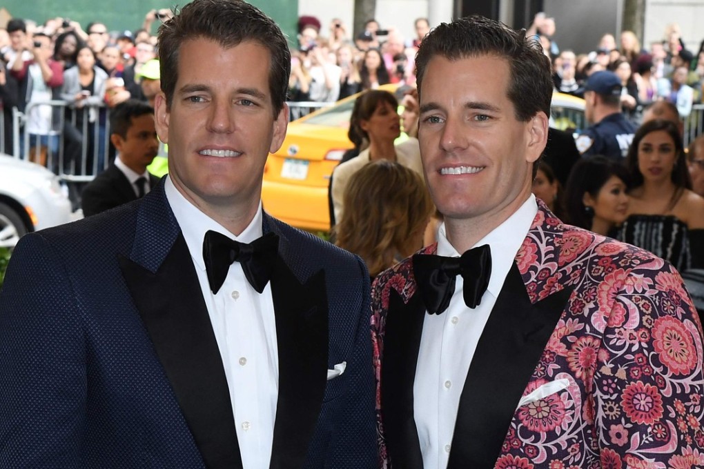 Cameron Winklevoss and Tyler Winklevoss arrive for the Costume Institue Benefit May 1, 2017 at the Metropolitan Museum of Art in New York. Photo: AFP/ANGELA WEISS