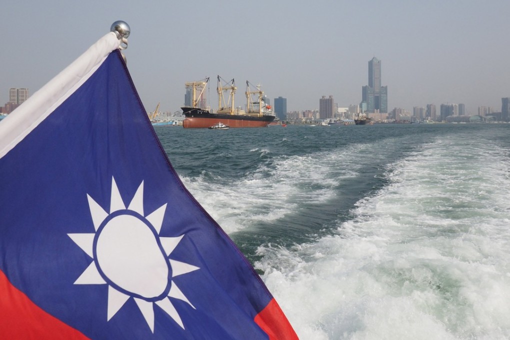 A Taiwanese flag flying from a vessel sailing near the port of Kaohsiung in southern Taiwan. Photo: EPA
