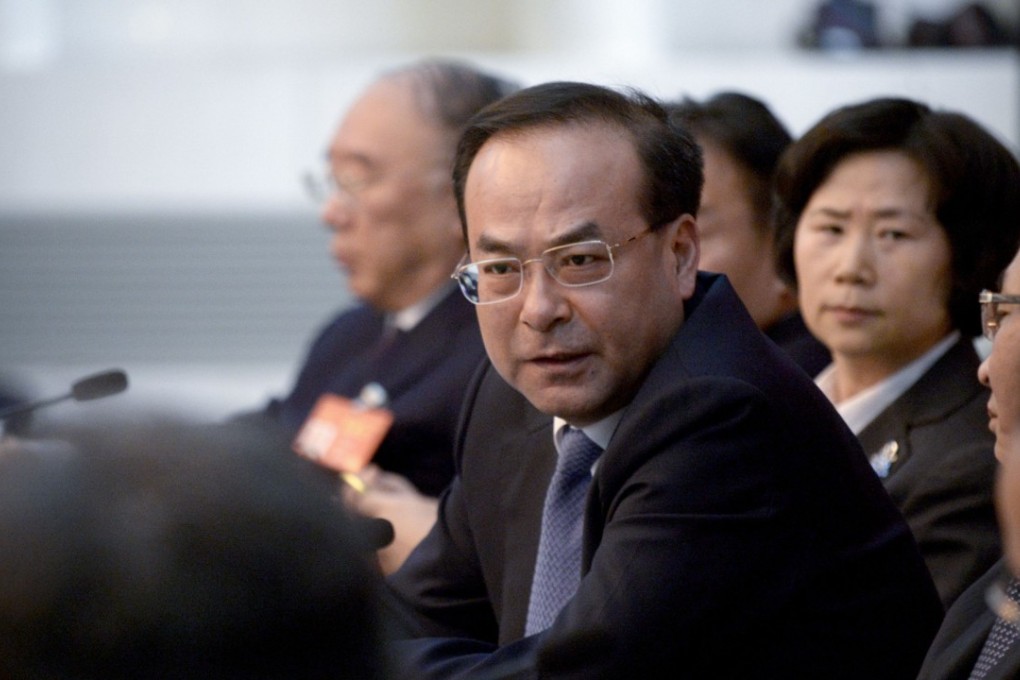 Sun Zhengcai (centre) was abruptly removed from his position as party secretary in Chongqing in July. Photo: AFP