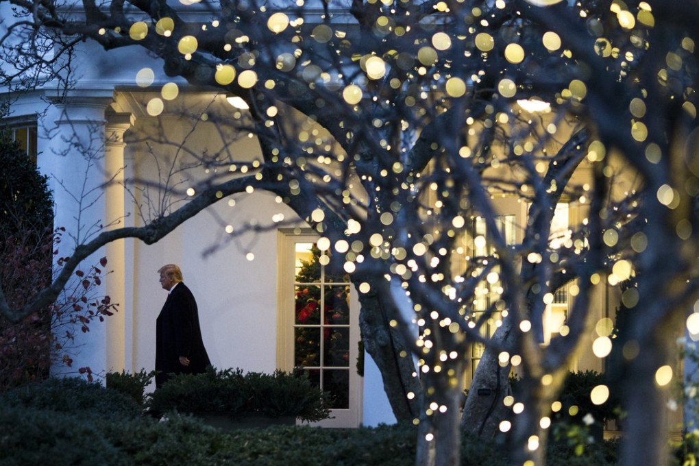 US President Donald Trump walks out of the Oval Office on Friday. The White House supports tweaking final tax legislation to appease lawmakers who want to let constituents deduct state income taxes, according to the National Economic Council Director. Photo: Bloomberg