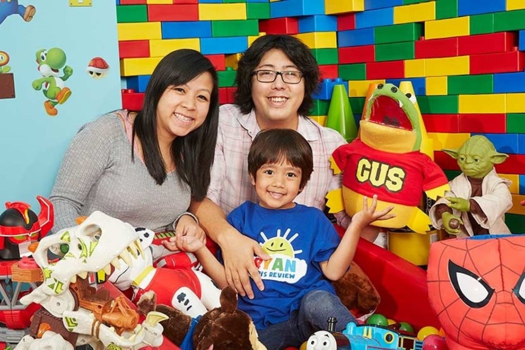 Six-year-old Ryan and his parents. Photo: YouTube / Ryan ToysReview
