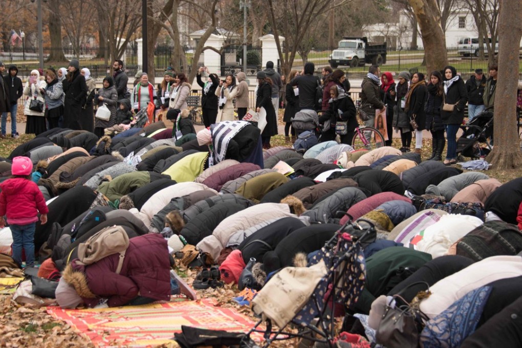 Muslim protesters hold Friday prayers in front of the White House, two days after President Donald Trump declared Jerusalem as the capital of Israel, in Washington on December 8. Photo: AFP