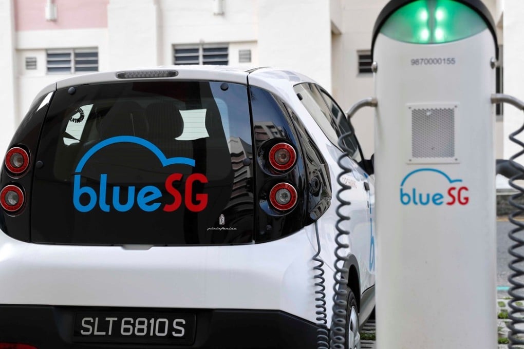 A BlueSG electric car-sharing vehicle at a charging station. Photo: Reuters
