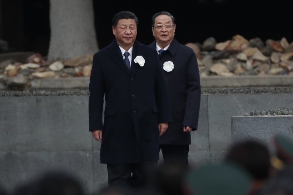 Chinese President Xi Jinping (left) and Chinese People's Political Consultative Conference chairman Yu Zhengsheng attend commemorations in Nanjing on Wednesday, the 80th anniversary of the Nanking massacre. Photo: EPA