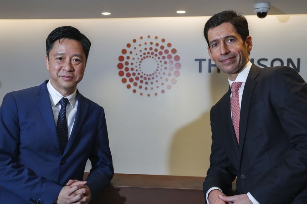 Dr. Meikei Ieong (left), chief technology officer at ASTRI, Sanjeev Chatrath (right), managing director, region head, Asia, financial and risk, Thomson Reuters. Photo: K. Y. Cheng