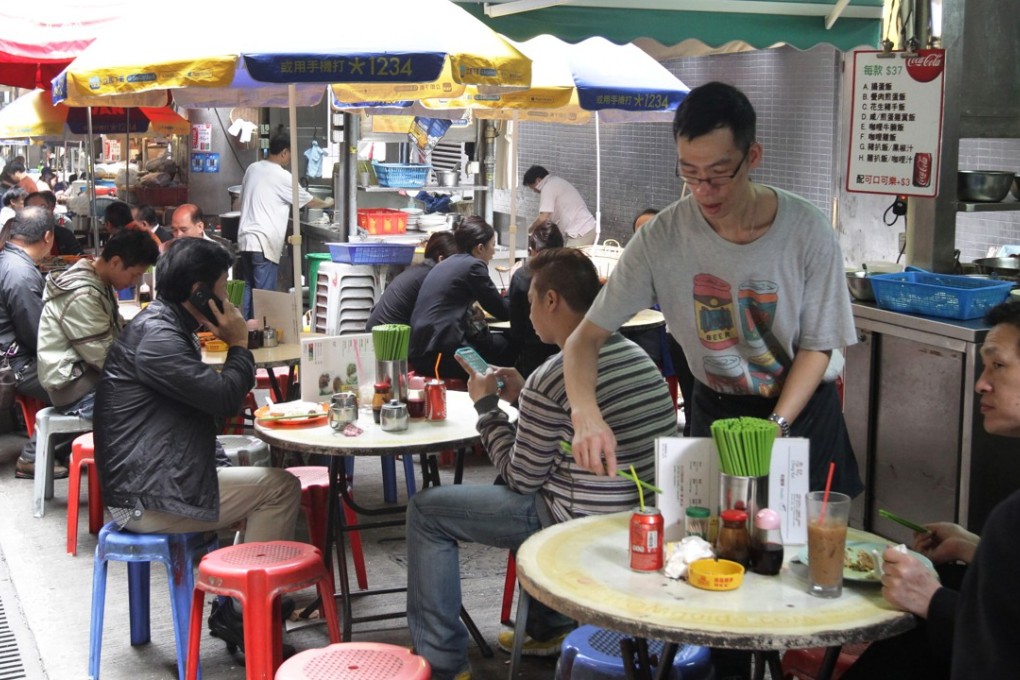 Eating at one of Hong Kong’s many street restaurants will certainly keep living costs down. Photo: Dickson Lee