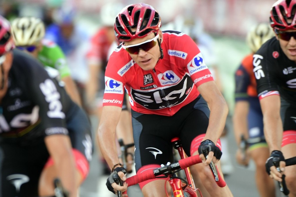 Team Sky’s British cyclist Chris Froome (centre) riding in Madrid during the 21st and last stage of La Vuelta. Photos: AFP