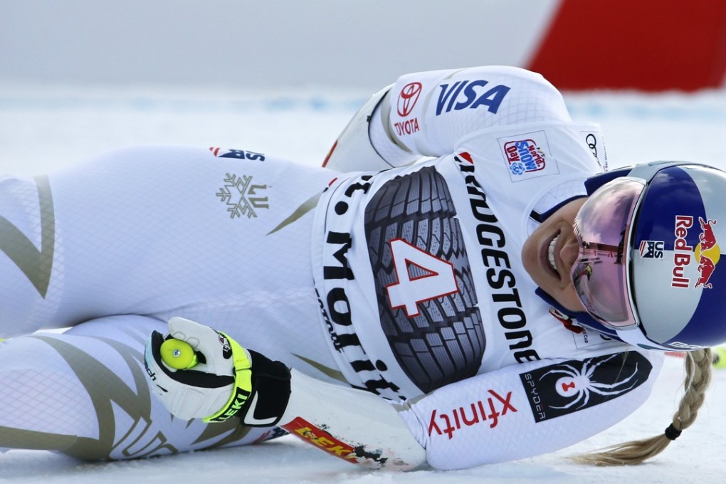 Lindsey Vonn grimaces in pain after crossing the finish line during the women’s super-G race at the FIS Alpine Ski World Cup in St Moritz, Switzerland. Photo: EPA