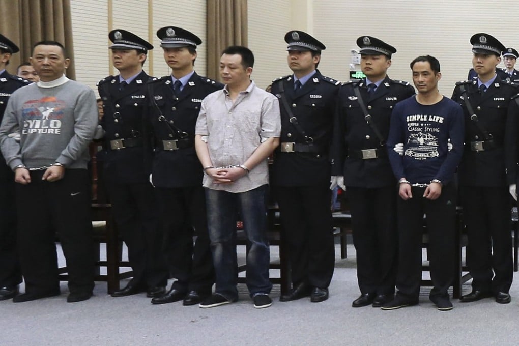 Former mining tycoon Liu Han, his brother Liu Wei and other defendants on trial at the Xianning Intermediate People's Court in Xianning, Hubei province on May 23, 2014. Hanlong Group collapsed in the wake of Liu Han’s arrest and conviction. Photo: Xinhua