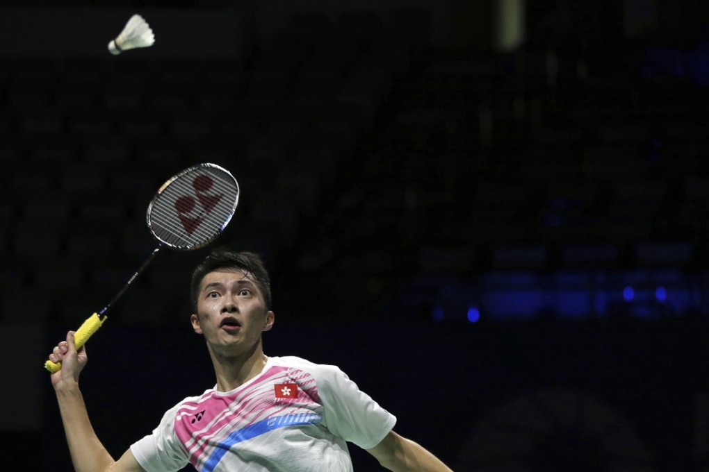 Hong Kong’s Angus Ng returns a shot to South Korea's Son Wan-ho during his round-robin match in Dubai. Photo: AP