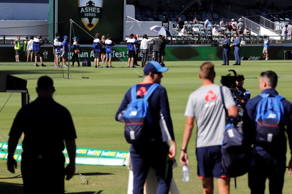 England players James Anderson and Stuart Broad walk out onto the WACA ahead of the third Ashes test against Australia. Photo: Reuters
