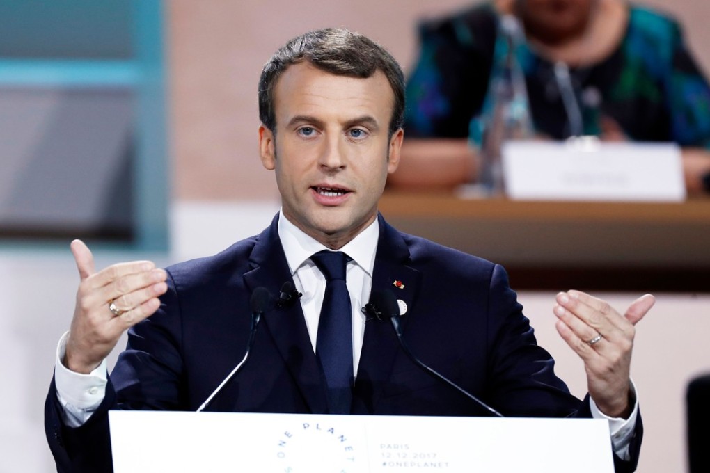 France’s President Emmanuel Macron delivers a speech at the One Planet Summit on Tuesday in Boulogne-Billancourt, southwest of Paris. He said that two years after the Paris Agreement was adopted progress in the fight against global warming has been slow. Photo: AFP