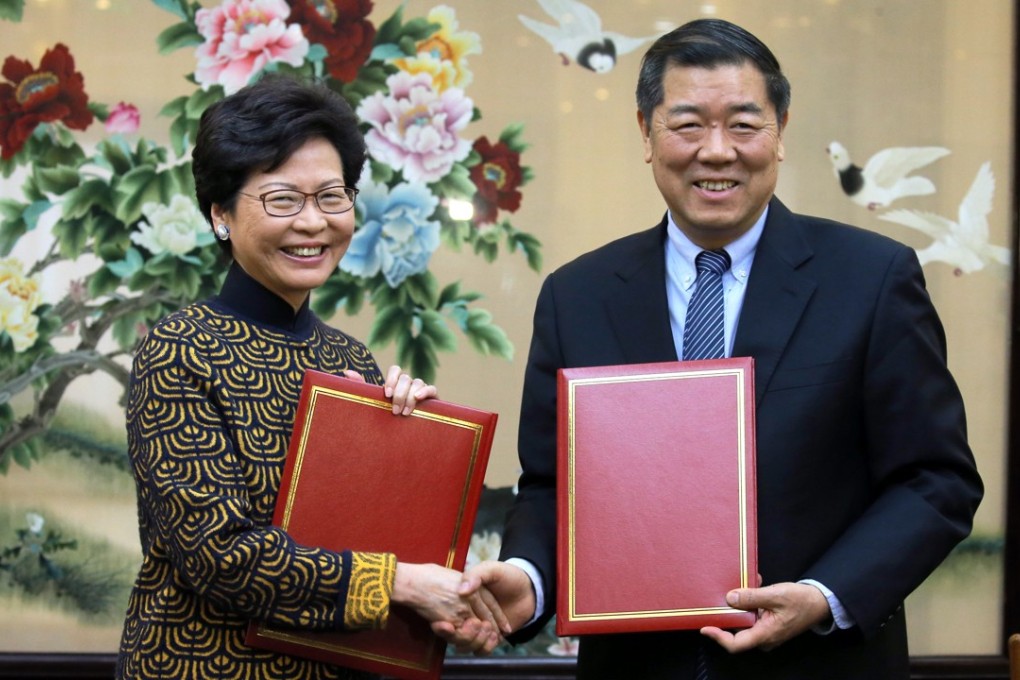 The agreement was signed after a closed-door meeting between Hong Kong Chief Executive Carrie Lam Cheng Yuet-ngor (left) and National Development and Reform Commission chief He Lifeng. Photo: Dickson Lee