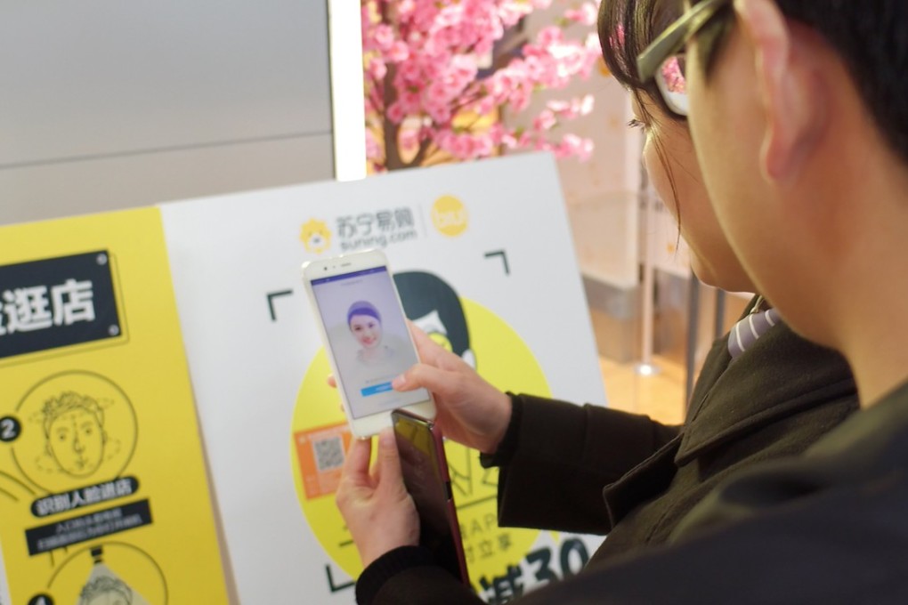 A customer scans her face to make a purchase at Suning’s unmanned store in Shanghai. Photo: Handout