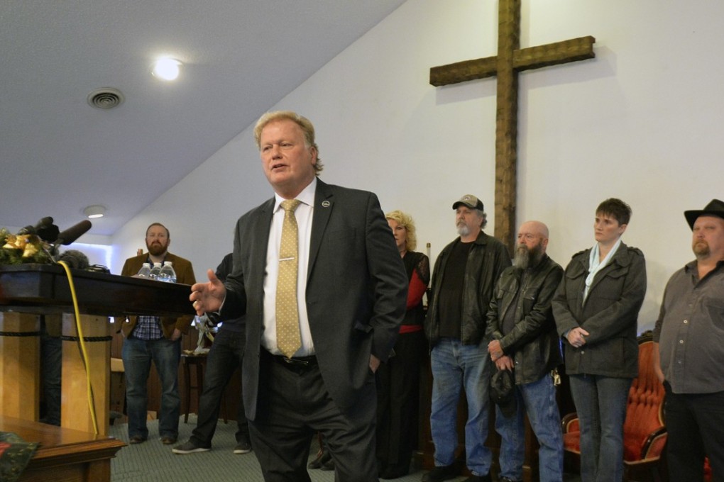 With friends and family standing behind him at his Church in Louisville on Tuesday, Kentucky State Representative Dan Johnson addresses allegations that he sexually assaulted a teenager. He is now dead of apparent suicide. Photo: AP