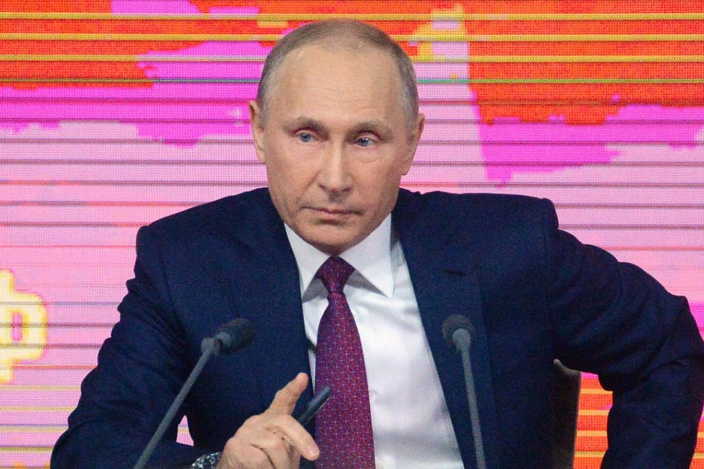 Russian President Vladimir Putin speaks at his annual end-of-year press conference in Moscow. Photo: Kyodo