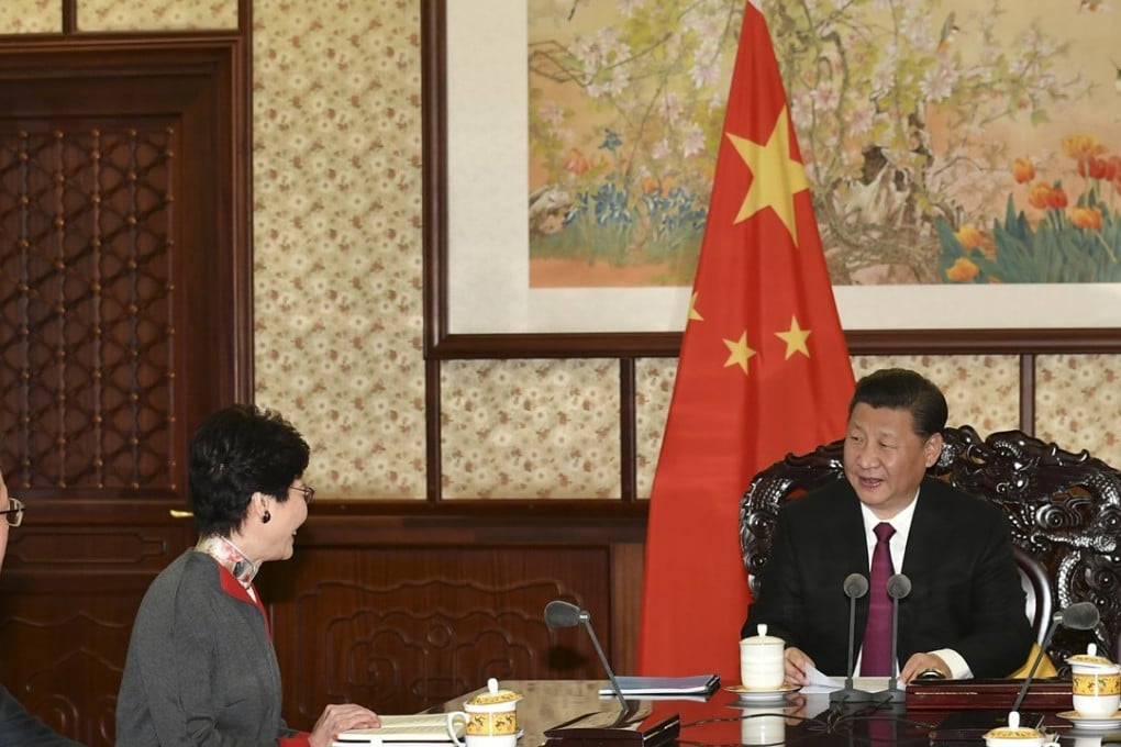 Hong Kong’s leader Carrie Lam (second left) said she did not discuss the controversial national security legislation with China’s President Xi Jinping, but stressed that the city had a constitutional responsibility to enact it. Photo: ISD