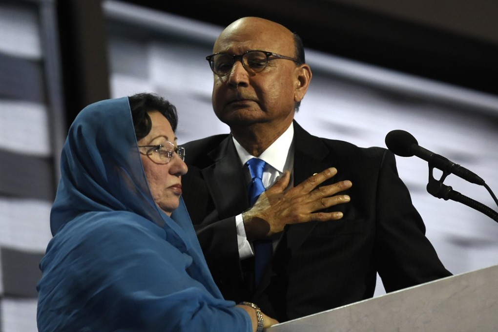 Khizr Khan addresses the Democratic National Convention in Philadelphia with his wife, Ghazala, in 2016. Photo: The Washington Post