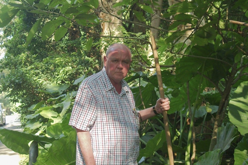 Former police chief inspector Richard Cresswell at the scene of the murder near Fanling, in Hong Kong’s New Territories, on what in 1952 was a military road. Picture: Stuart Heaver