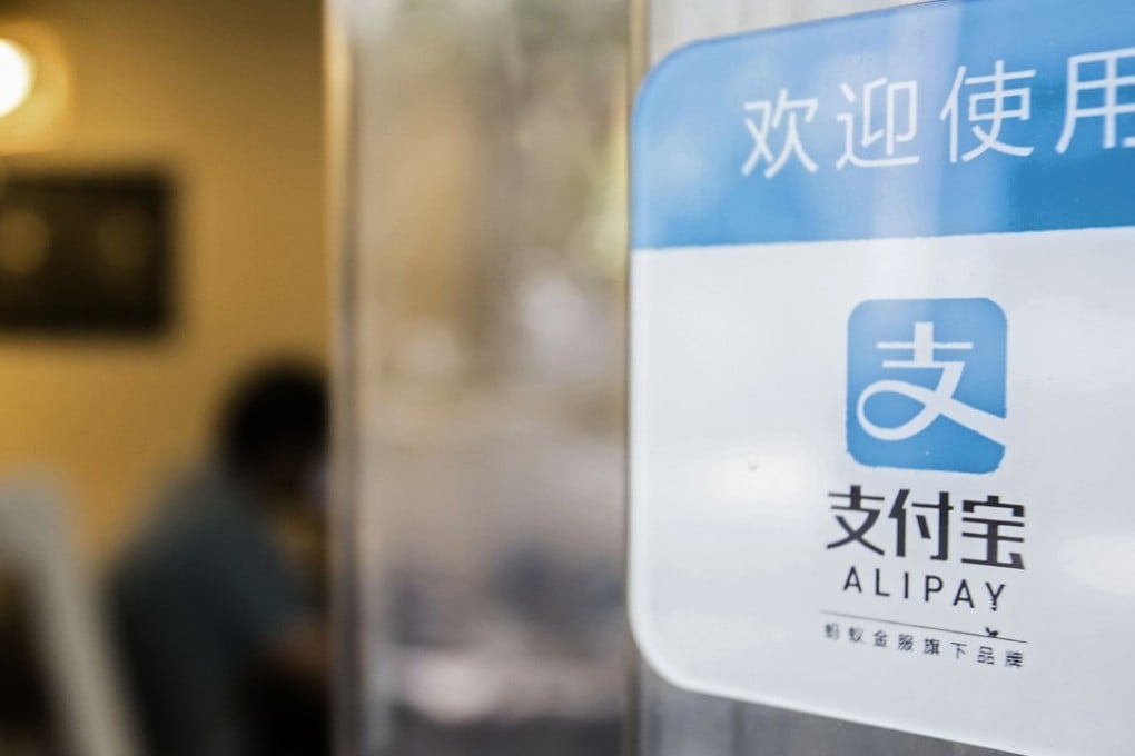 A sign for Ant Financial’s Alipay payment system. The affiliate of Alibaba Group Holding distributes the Yu’e Bao money market fund, which manages money transacted through Alibaba’s e-commerce platforms. Photo: Bloomberg