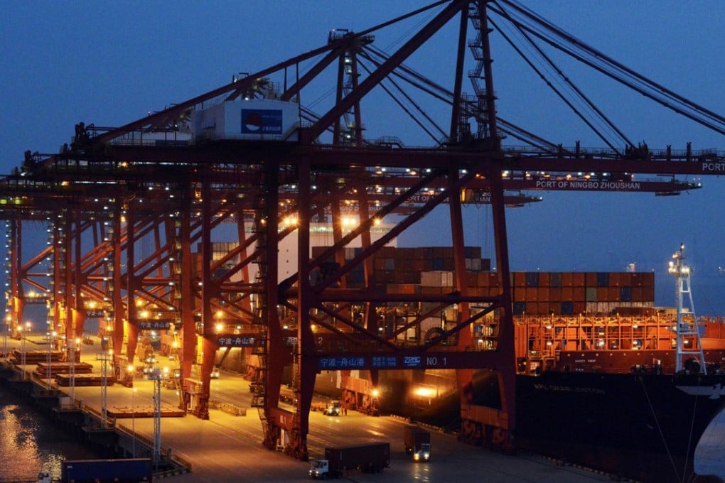 Trucks loaded with cargo containers at the Ningbo Zhoushan Port in Zhejiang province. Photo: Reuters