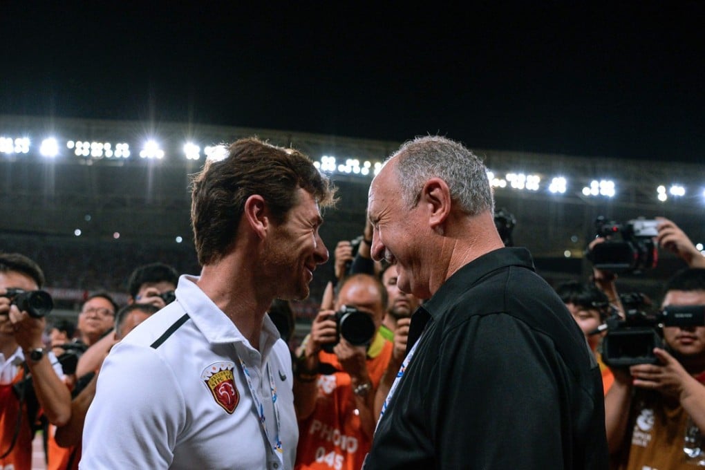 (FILES) Shanghai SIPG's Andre Villas-Boas greets Guangzhou Evergrande's Luiz Felipe Scolari ahead of their AFC Champions League tie. Photo: AFP
