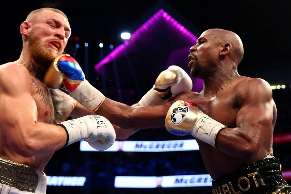Floyd Mayweather Jnr (right) has been involved in the top three highest-grossing fights. Photo: USA TODAY Sports