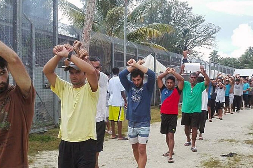 Asylum seekers and refugees at the Manus Island immigration detention centre in Papua New Guinea. The asylum seekers have been given the green light to sue the PNG government for compensation. Photo: EPA