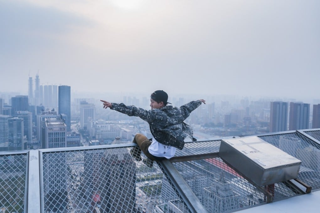 Tong Shenglin takes in life at the top of a building in Shenyang, Liaoning province. Photo: Tong Shenglin