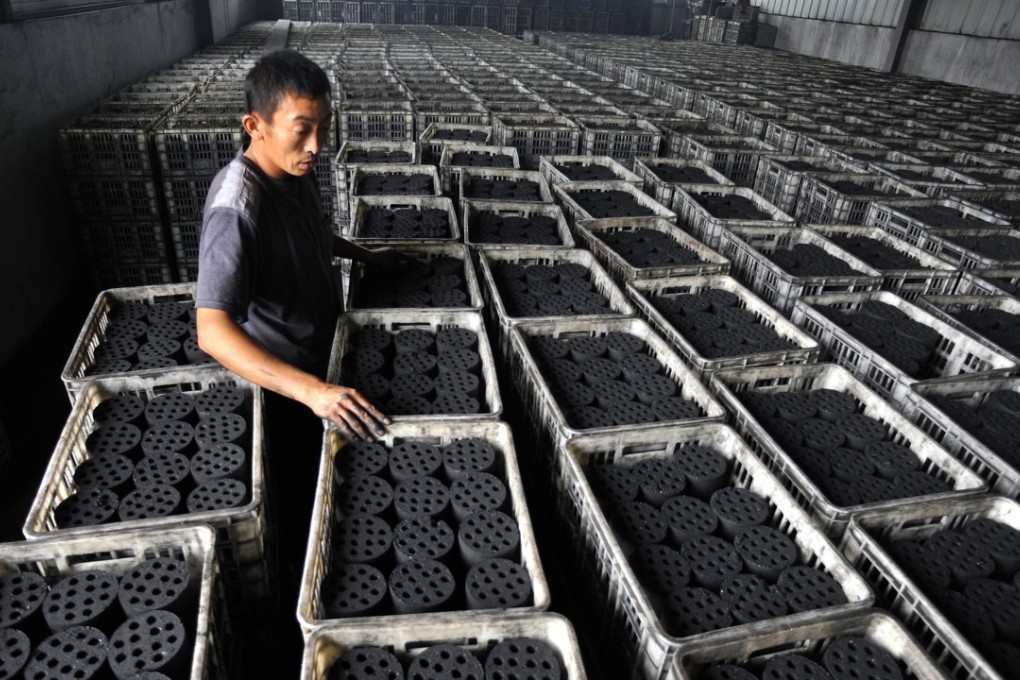 Many households are still reliant on coal despite the push to use gas instead. Photo: EPA