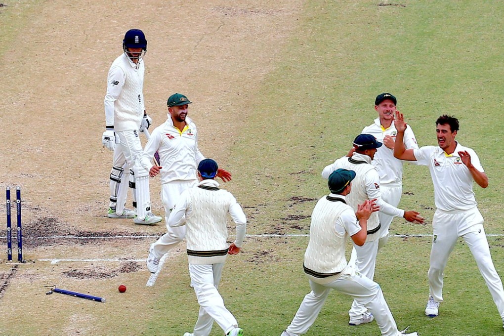 Australia's Mitchell Starc celebrates after bowling England's James Vince. Photo: Reuters