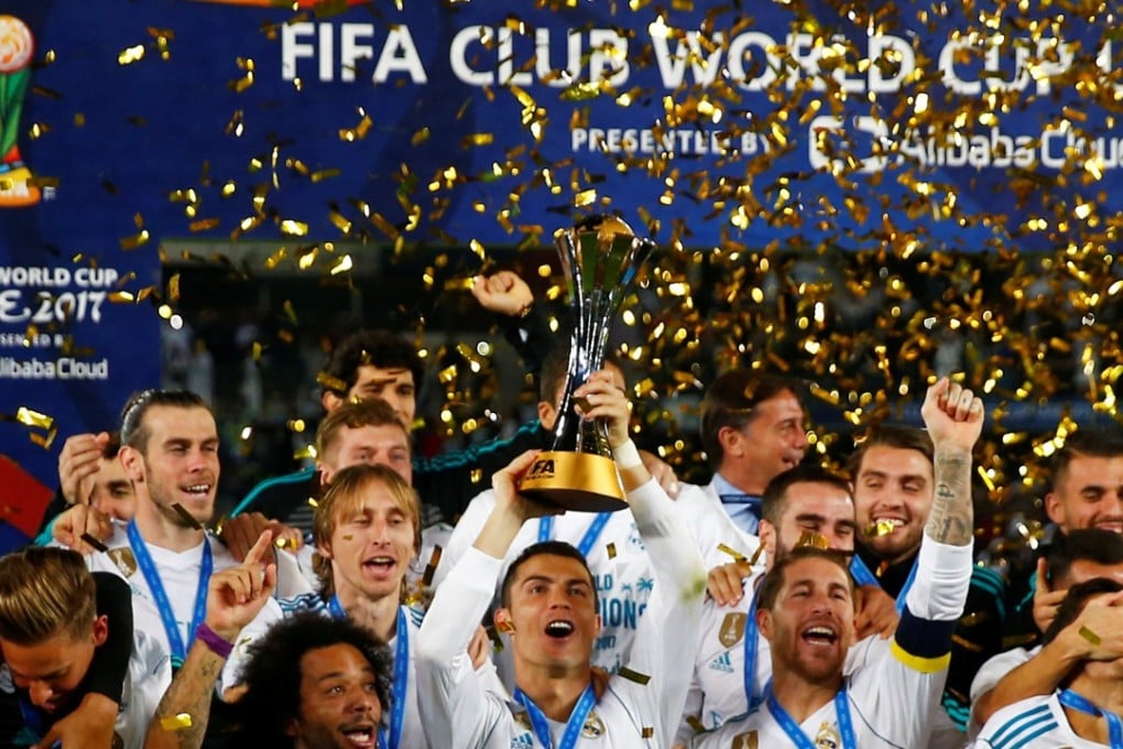 Cristiano Ronaldo and his Real Madrid teammates celebrate with the Club World Cup trophy. Photo: Reuters