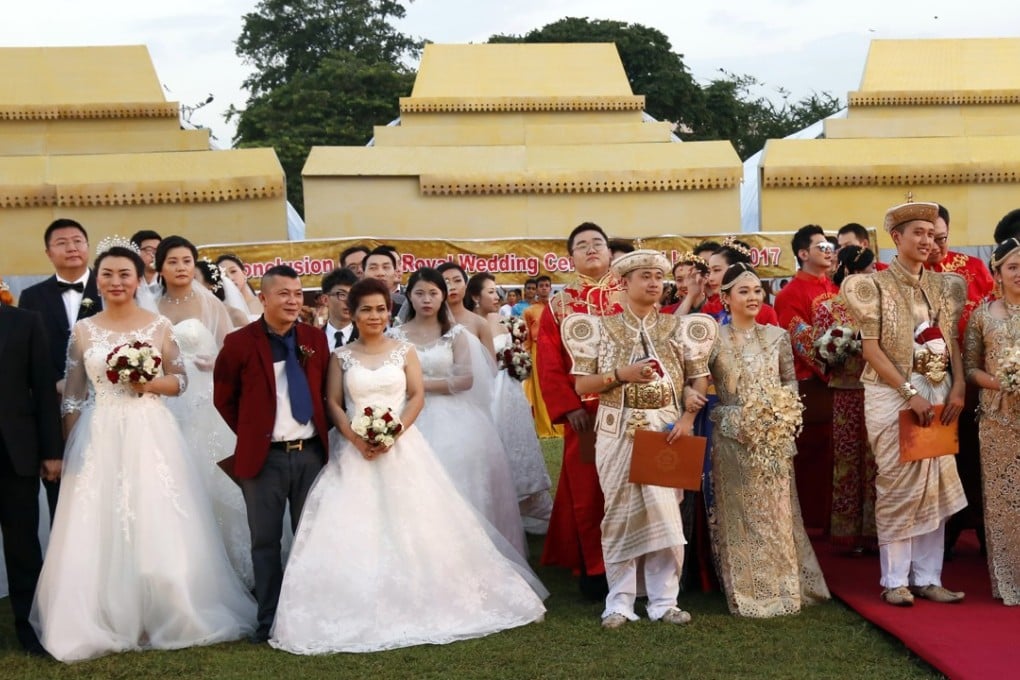 Some of the brides and grooms pictured at the ceremony in Colombo. Photo: EPA-EFE