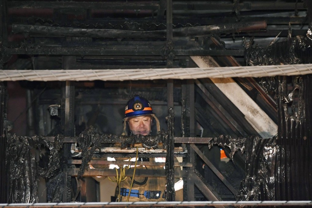 A firefighter at the scene. Photo: Kyodo