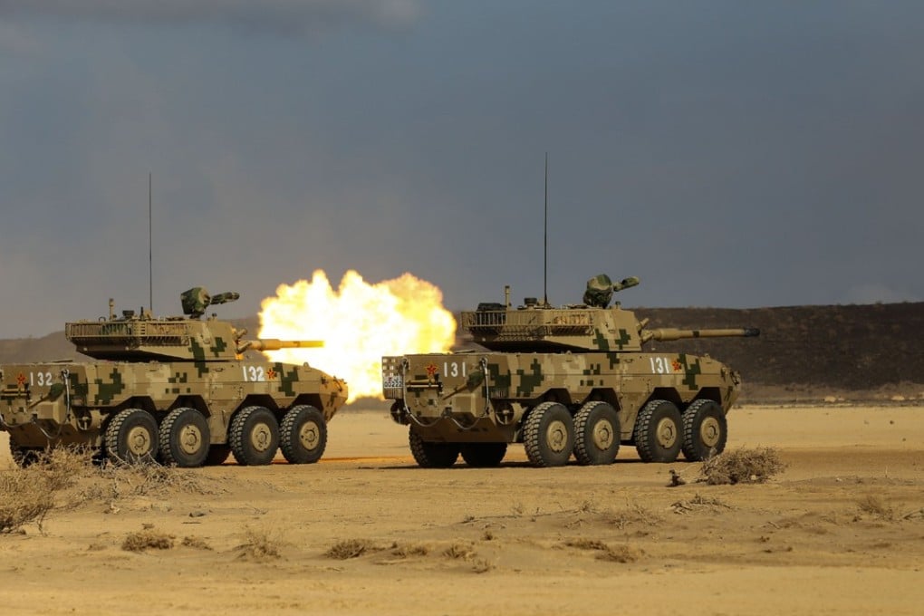Chinese armoured vehicles take part in a live-fire drill in Djibouti last month. Photo: Weibo