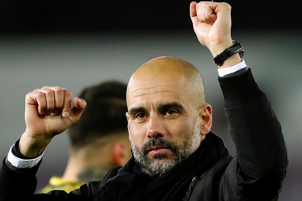 Manchester City manager Pep Guardiola celebrates victory over Swansea City. Photo: Reuters