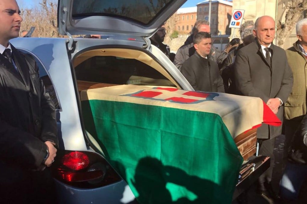 The coffin with the remains of Italy’s King Victor Emmanuel III arrives at the Sanctuary of Vicoforte, in Italy. Photo: AP