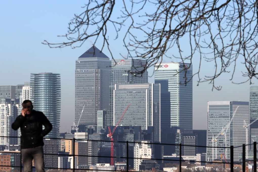 A view of Canary Wharf in London. Hong Kong’s Kingboard bought 15 Canada Square in the business district in east London for £400 million. Photo: Bloomberg