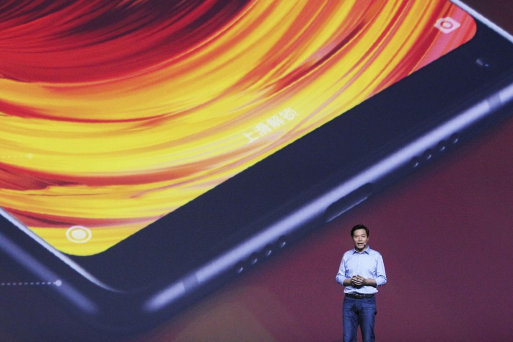 Lei Jun, CEO and founder of Xiaomi, introduces the new Mi Mix 2 smartphone, in Beijing on September 11, 2017. The company is rewarding customers with cash coupons after a record year in smartphone sales. Photo: Simon Song