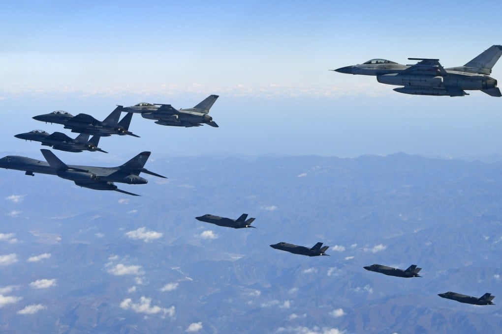 South Korean air force jets take part in a drill earlier this month. Seoul said on Monday it scrambled F-15K and KF-16 fighters to monitor Chinese military aircraft that had entered its air defence identification zone. Photo: EPA-EFE