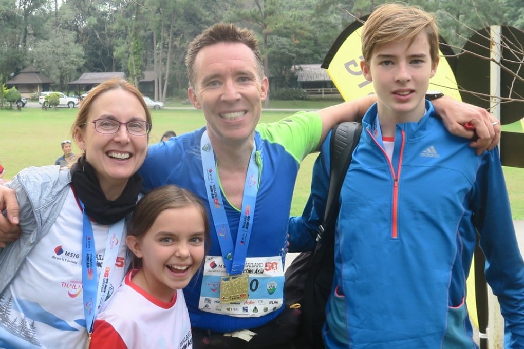 The Dingleys at the finish line in Chiang Mai in Thailand. Parents Jeana and Peter have encouraged their children to take up running to reduce time on social media. Photos: Action Asia Events