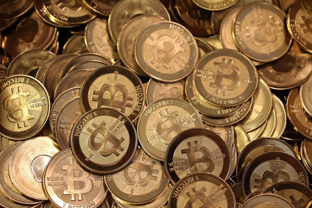 A pile of bitcoin tokens. The virtual currency has started trading on its second major exchange in a week with the launch of futures contracts on the CME. Photo: Getty Images