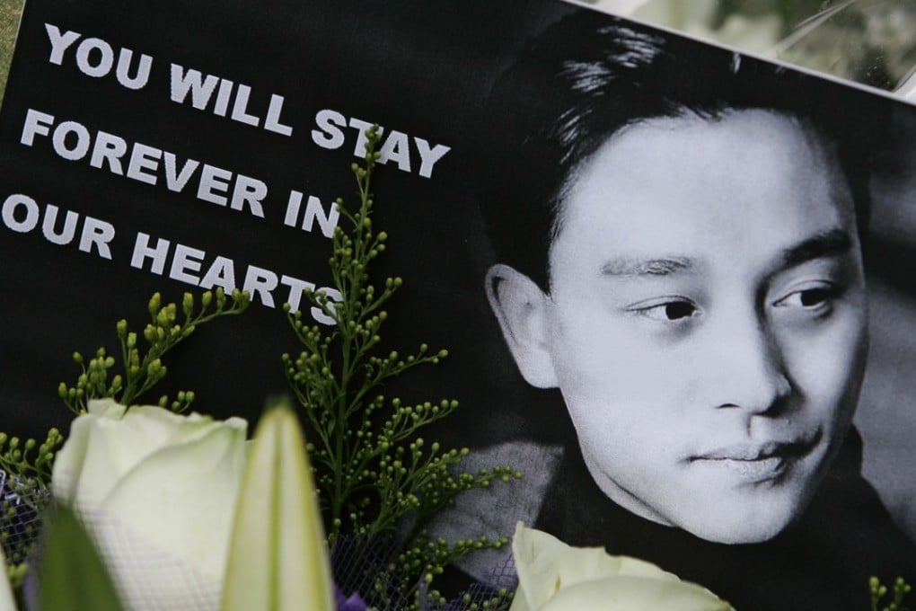 A picture of Hong Kong actor and singer Leslie Cheung is placed on an altar set up outside a downtown hotel in Hong Kong. Photo: AP