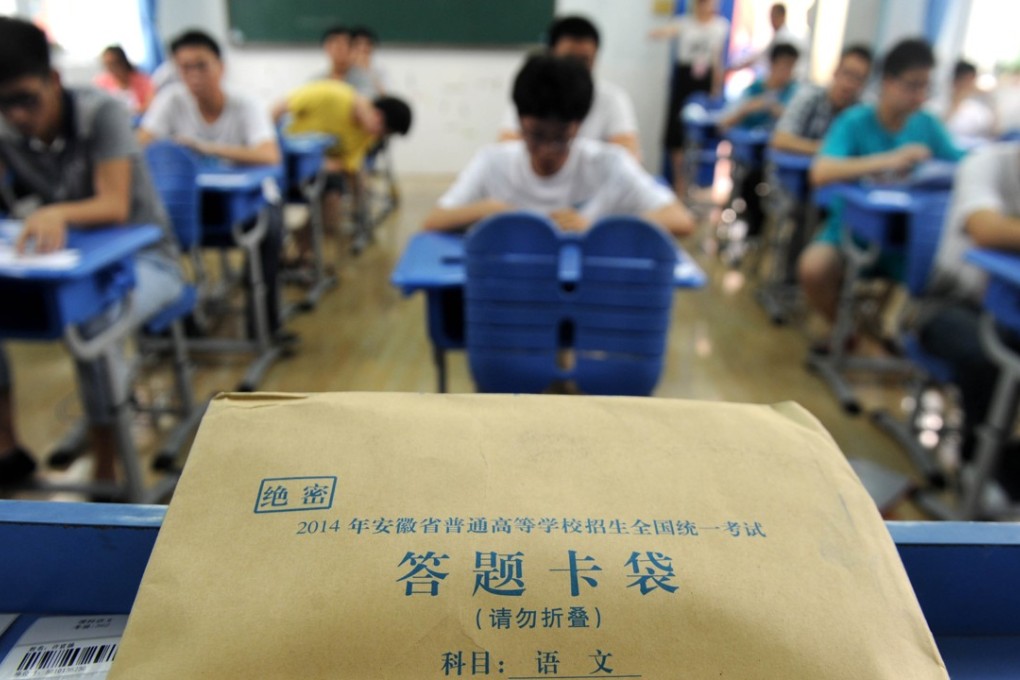 Candidates take the national college entrance exam in Hefei, capital of east China's Anhui Province. Photo: Xinhua