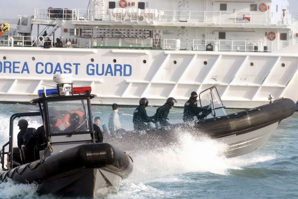 South Korean coastguard vessels take part in a training exercise. The coastguard said it fired 249 warning shots over a group of Chinese fishing boats “swarming around” one of its patrol ships in South Korean waters on Tuesday. Photo: Handout
