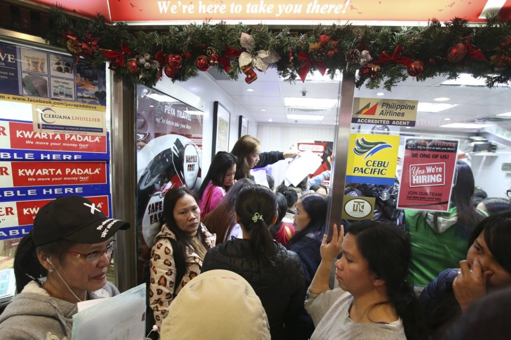 Customers affected in the ticket fiasco crammed into the Peya Travel shop in World-Wide House on Wednesday looking for information. Photo: David Wong