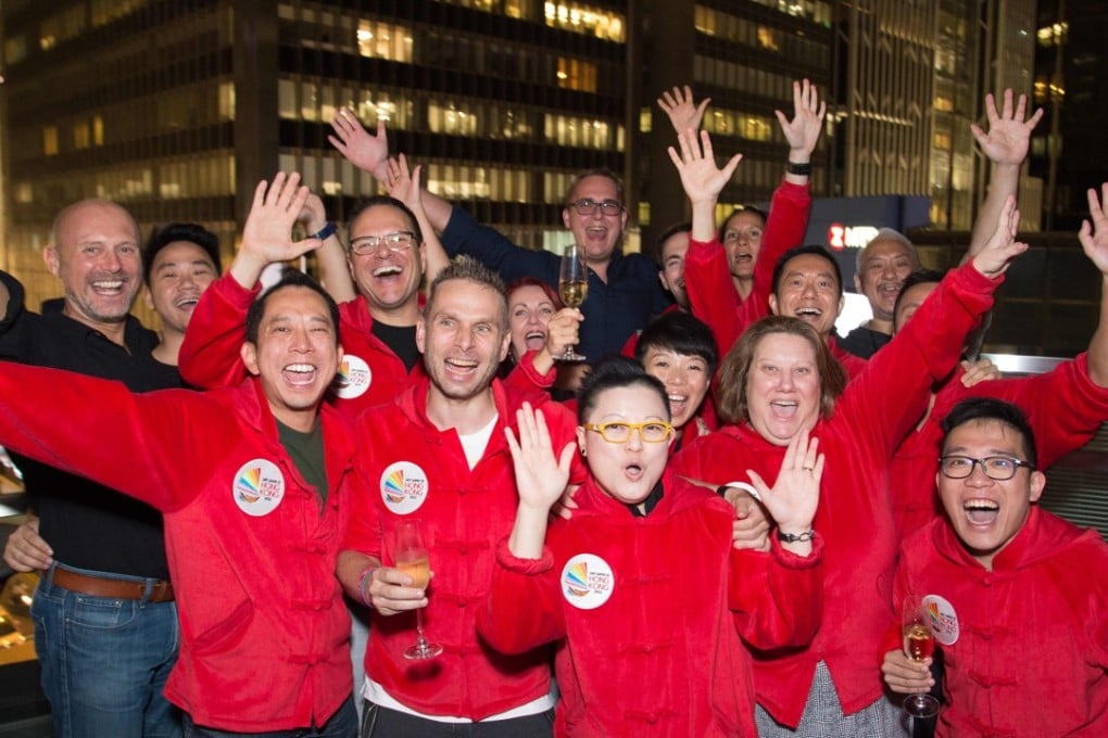 Delegates celebrate Hong Kong securing the 2022 Gay Games in November. Photo: AFP